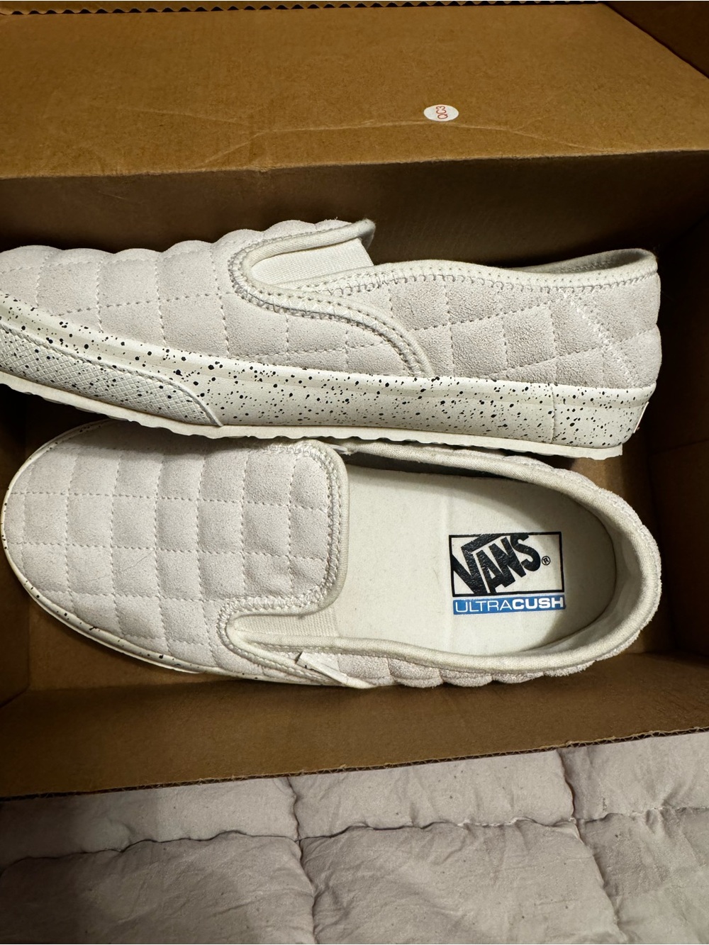 Vans Quilted Slip-On Sneakers in White- Speckled Marshmallow